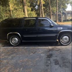 2002 Chevy suburban The only thing wrong with it I need a battery and it needs brake calibers in the back and he got a little bit over 200,000 miles