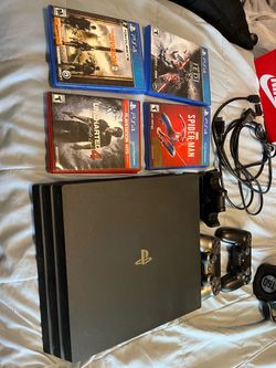 Sony Play station 4 pro with games and controllers