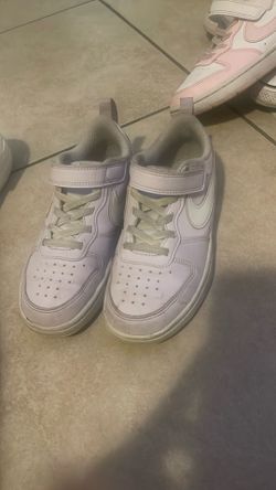 Girl’s purple Nike size 13.5