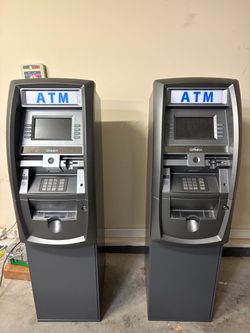2 Genmega G2500 ATM Machines + Extra Cash Dispenser & Receipt Paper + 2 LED ATM signs