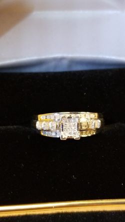 diamond ring..invisible setting ...s1 diamonds