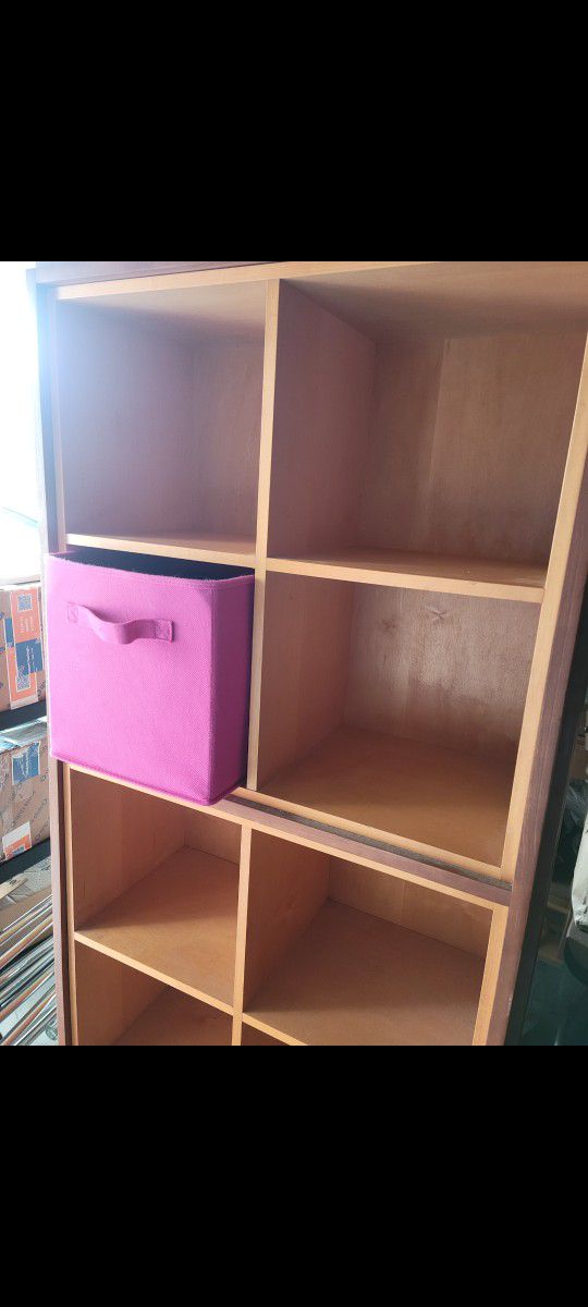Large Wooden Cabinet with 8 Cubbies Each Side  (Total 16 Cubbies) and 1 Large Gentle Glide Drawer. Very Heavy...will need 2 strong people