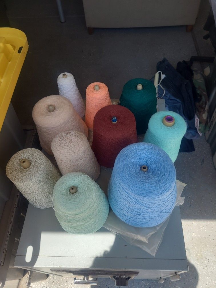 Spools Of Yarn For Knitting Machines