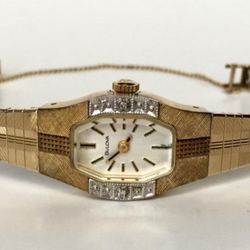 Vintage ladies two tone BULOVA diamond watch with original bracelet. On the top of case 2 diamonds from sides. Crystal measured 15 mm x 10 mm, depth 8
