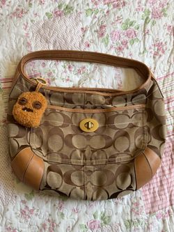 Coach signature large ergo turn lock hobo