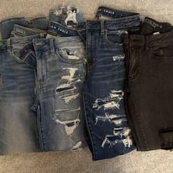 Four Pair Of American Eagle Straight-leg Jeans