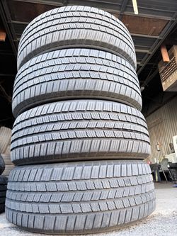 4 used 235/55R19 Michelin Defender LTX M/S Tires