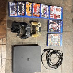 PS4 Slim W/ 2 Controllers And 8 Games 