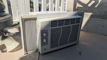 Window AC unit with accordion