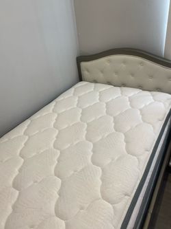 Twin bed with box spring and mattress