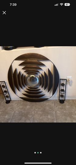, decor, mirror, and to candle holder is very nice one