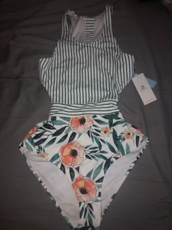 Size large bathing suit one piece open back $10 never worn