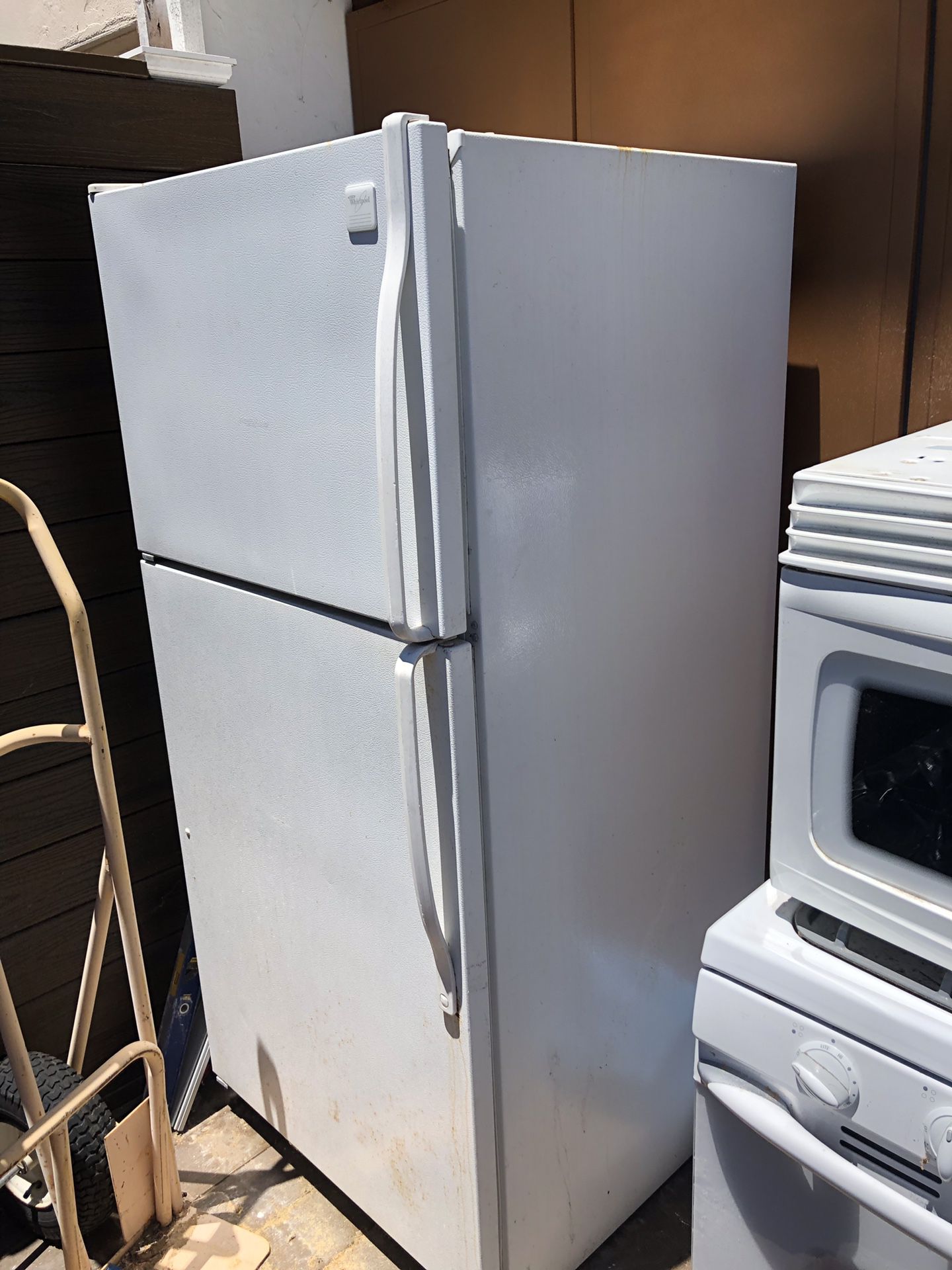 FREE REFRIGERATOR ,STOVE AND MICROWAVE IN WORKING CONDITION