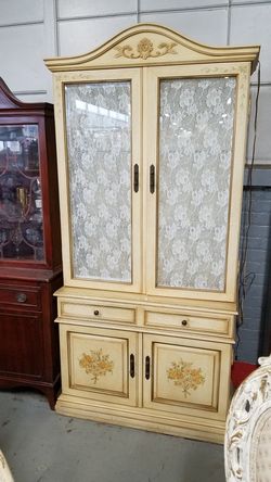 French provincial stenciled cream colored wood lighted china cabinet