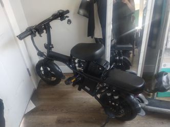 E bike 2 seater plug in almost new
