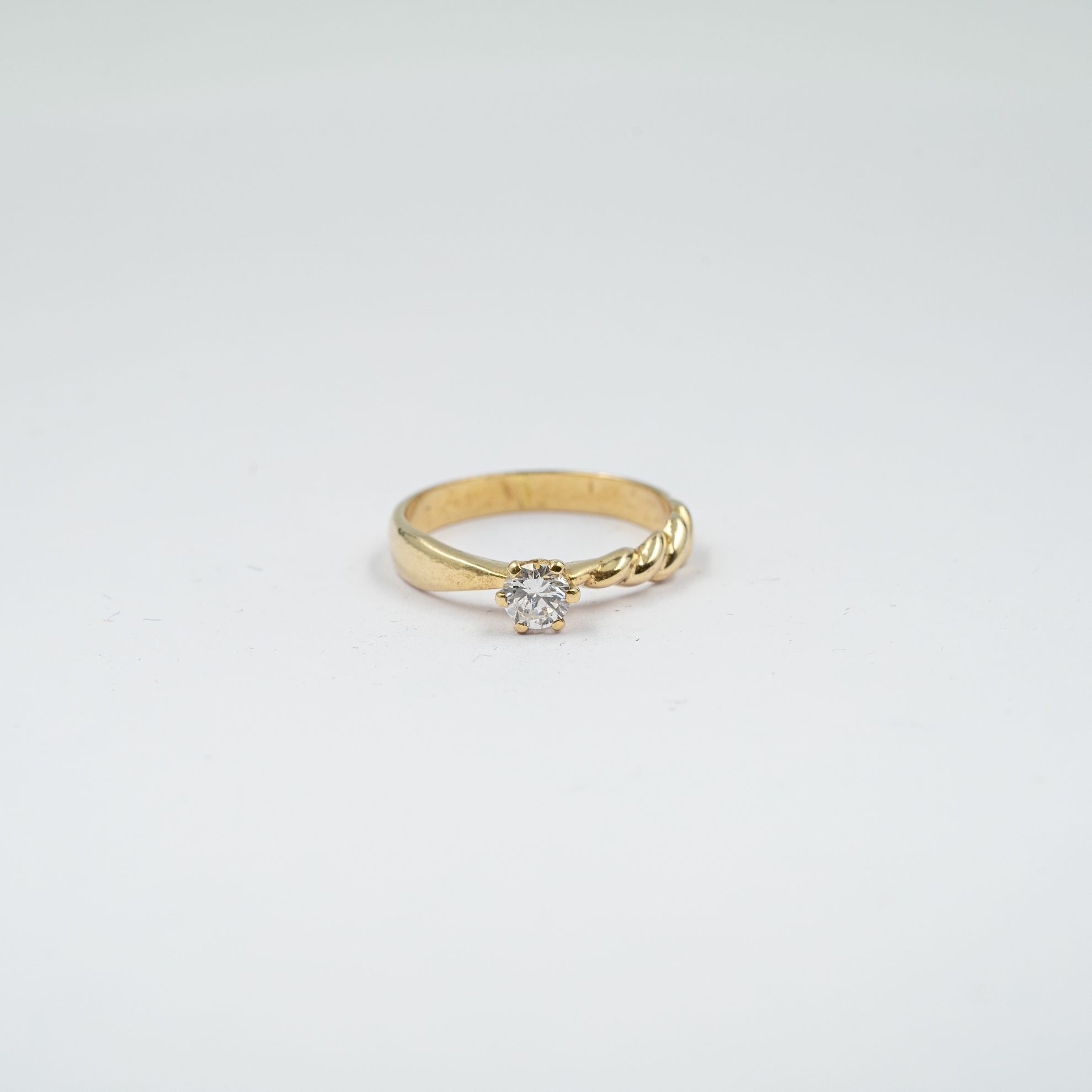 Half-Twisted Tapered Solitaire Diamond Ring