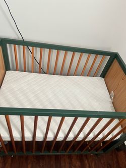 Infant wooden green crib with mattress