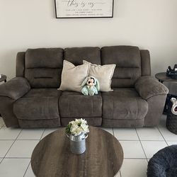 Grayish/ Brown Faux Leather recliner with tables