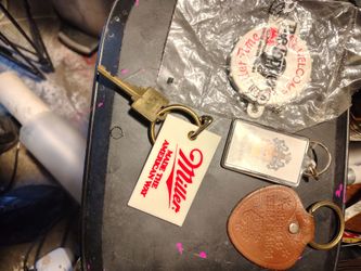Vintage miller brewery employee manual and keychain tag of Fulton brewery