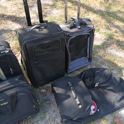 LOTS OF NICE PULL ALONG LUGGAGE