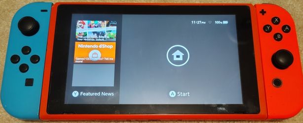 Red Nintendo Switch with Many Digital Games