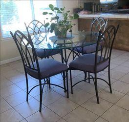 48" Glass table and 6 chairs