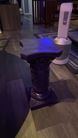 Pillar made of plaster but painted Purple