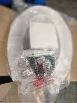 American Standard Champion Two-Piece 1.28 GPF Single Flush Elongated Chair Height Toilet with Slow-Close Seat in White 