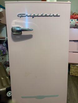 Pink mini fridge