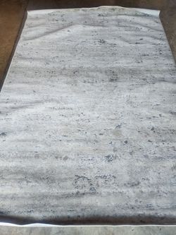 Large rug (brand new)