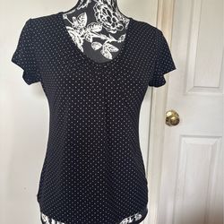 Polka dots fitted top short sleeve size M. 34” circumference bust without stretching. 22.5” from shoulder down. Gently used. Comes from a smoke free e