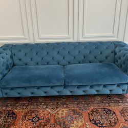 Beautiful blue teal sofa