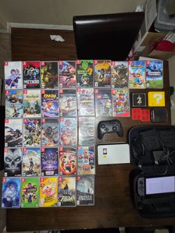 800 obo Switch Oled with 32 games and accessories.