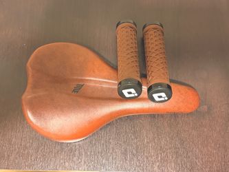 Title MTB Bike Saddle with ODI Handlebar Grips Brown MTB, gently used stuff