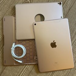 iPad Pro 9.7” (Rosegold) 128GB WiFi + Cellular Unlocked with Rosegold Keyboard Case & Charger 