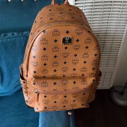 backpack for sell brown/gold