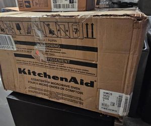 KITCHENAID STAINLESS STEEL MICROWAVE OVER THE COUNTER....2.2 CU....NEW...$ 180