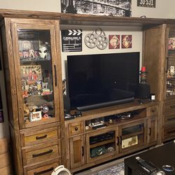 Wall/TV Unit with A lot Of Storage Space. Make An Honest Offer. I Paid $1500.00 For It. Also It’s In Mint Condition 