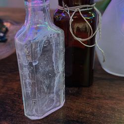 Vintage set of 10 apothecary/different antique bottles dating back to the early 1900s