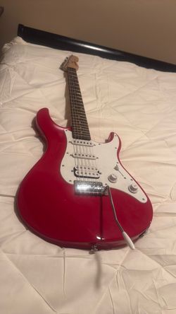 Red Electric Guitar with Tremolo Bar