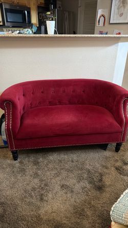 Accent red love seat