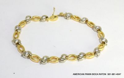 14K Two Tone Gold Swirl and Oval Link Diamond Bracelet 1.50 tcw 7 inches