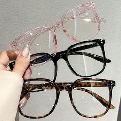 4 pack of blue light blocking glasses. Black, pink, clear, and cheetah. Brand new!!