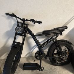 Electric bike with battery and storage box