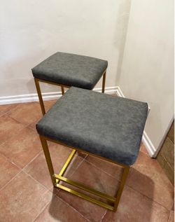 Four stools for sale grey and gold
