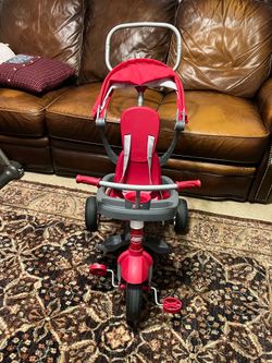 Radio Flyer 4-in-1 Stroll 'N Trike (Red) — For children ages 1-5, with a maximum weight capacity of 49 Ibs.