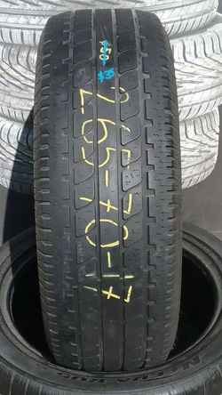 One used 265 70 17 Definity tire