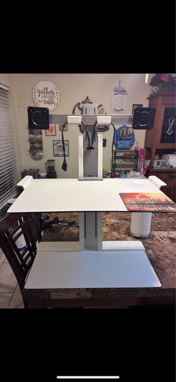 Standing desk with monitor mounts