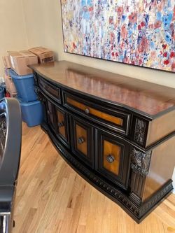 Formal Dining room table with 8 chairs and a buffet