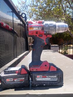 Milwaukee cordless drill plus 6.0ah and 5.0ah battery